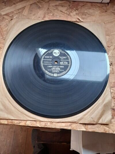 Lena Horne.A new fangled tango/Honeysuckle rose.RCA.EX+.Slight hairline NAP.Rare