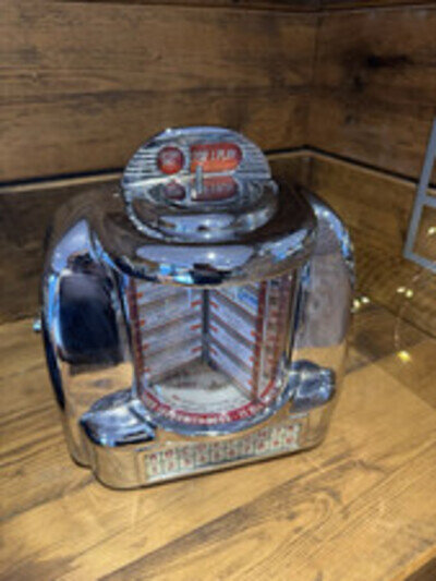 jukebox machine used , wall mounted