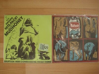 2 MUDHONEY 7 INCH VINYL SINGLES. ONE SPLIT WITH MELVINS. COLORED VINYL