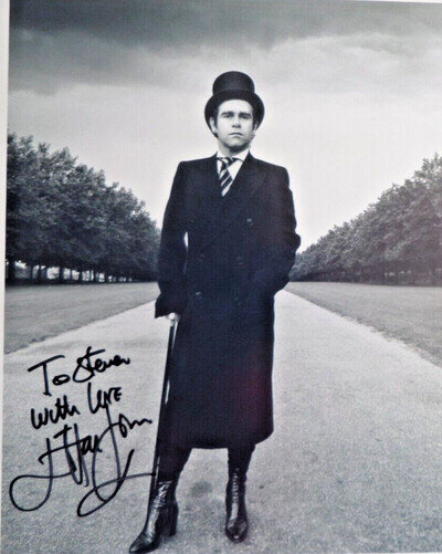 SIR ELTON JOHN AUTOGRAPHED 10 X 8 PHOTOGRAPH.