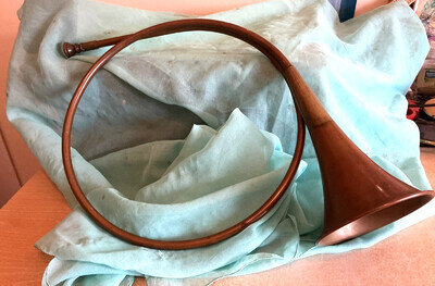 vintage copper and brass rounded hunting horn with fixed mouthpiece