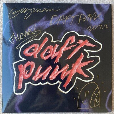**HAND SIGNED** DAFT PUNK Homework 2lp Signed by both members NEAR MINT