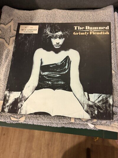 The Damned Grimly Fiendish White Vinyl 12 Inch Limited Edition Numbered Single