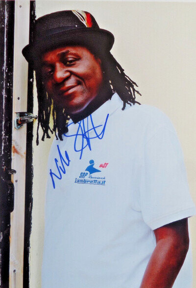 NEVILLE STAPLE SPECIALS AND FUN BOY THREE, AUTOGRAPHED A4 PHOTOGRAPH.