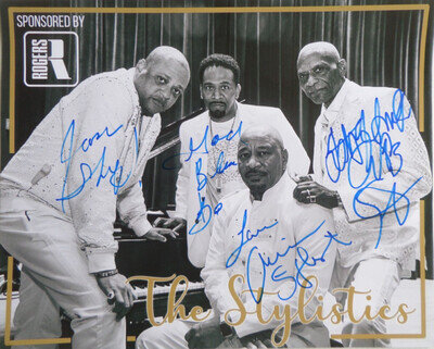 THE STYLISTICS AUTOGRAPHED 10 X 8 PHOTOGRAPH. SIGNED BY ALL FOUR.