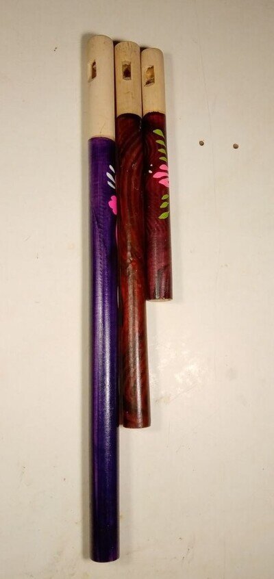 Set of folk musical instruments Ukrainian sopilka painted wooden pipe handmade