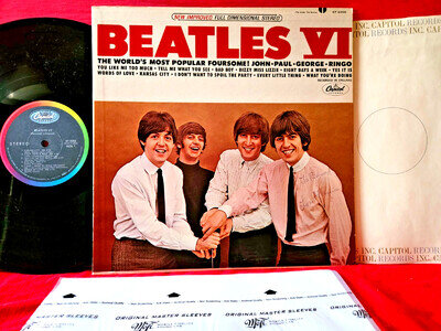 "Beatles VI" 1968/69 black label, NM/NM, signed by George's sister 'Louise'