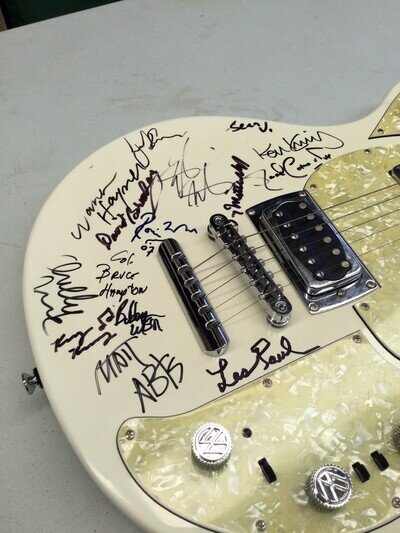 Autographed by Les Paul, Bob Weir, Ron Wood, Warren Haynes, Jorma, Col. Bruce
