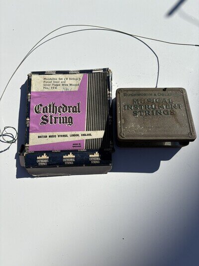 A Collection of Cathedral Mandoline Strings and Rushworth & Dreapers Vintage Tin