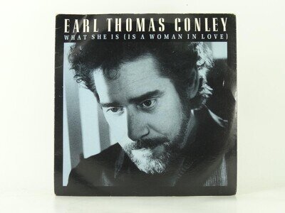 EARL THOMAS CONLEY WHAT SHE IS (IS A WOMAN IN LOVE) (61) 2 Track 7" Single inclu