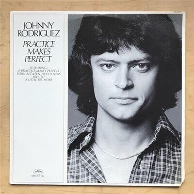 JOHNNY RODRIGUEZ PRACTICE MAKES PERFECT LP 1977 - LIGHT SIGNS OF USE (CORNER CUT