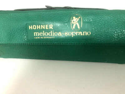 Vintage 1950's "HOHNER MELODICA" in green plastic carrying case.