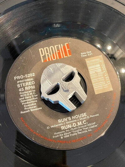 Shiny Silver Plastic 3D printed MF Doom 45 record adapter