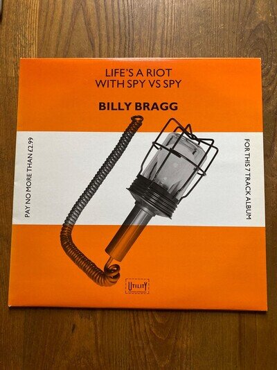 BILLY BRAGG-"LIFE'S A RIOT WITH SPY VS SPY" ON 12" VINYL LP. 7 TRACKS. UTIL 1.