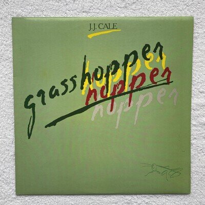 J.J. CALE " Grasshopper" 12ins.Vinyl LP Mercury 6302 177 Malaysia.1982.NM.EX.