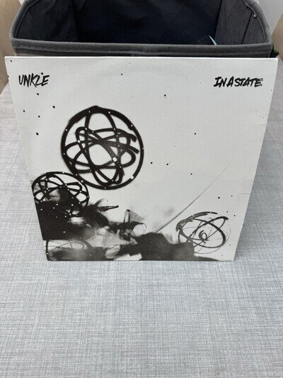 Unkle In A State Sasha Remix 12” Vinyl VG+ Condition.