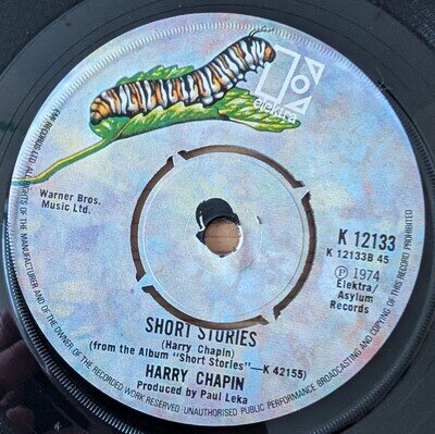 Harry Chapin – W.O.L.D. - UK 7" Vinyl Elektra K 12133 1974 (misaligned label)