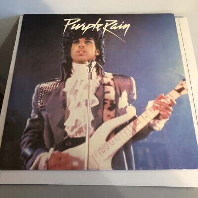 PRINCE AND THE REVOLUTION PURPLE RAIN 12" W9174T 1984 VG+.