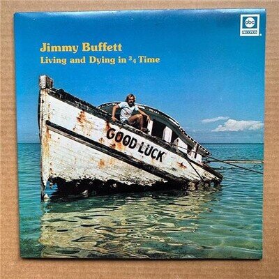 JIMMY BUFFETT LIVING AND DYING IN 3/4 TIME LP 1974 - nice copy in g/fold cover w