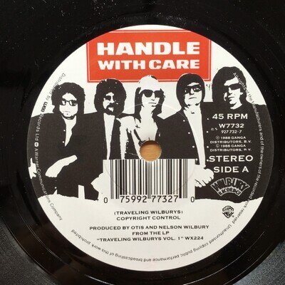 TRAVELING WILBURYS - HANDLE WITH CARE 7" VINYL (EX)