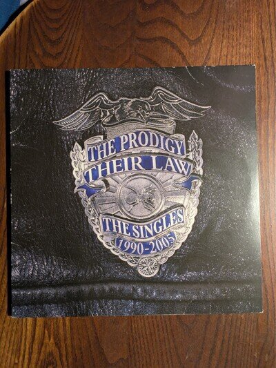 The Prodigy - Their Law - The Singles 1990-2005 - 12" Silver Vinyl Record 2014