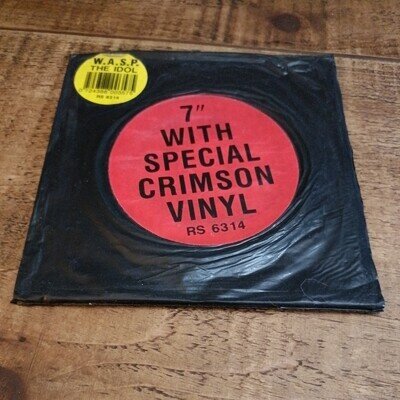 W.A.S.P. ‎– The Idol RS6314 Crimson 7" in Black Bag EX/EX
