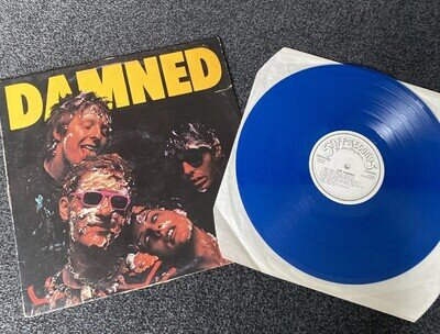 The Damned - D..D.D.Belgium Press BLUE VINYL ( TEAR ON COVER) rare Punk. .