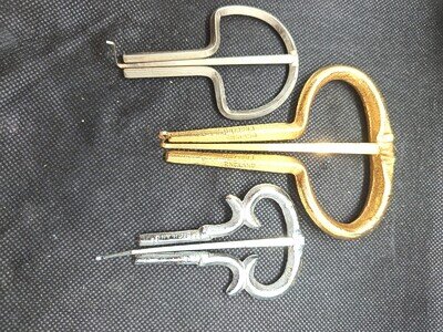 Vintage Brass Gold Jaw Harp Made in England plus two others.