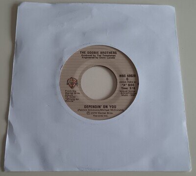 THE DOOBIE BROTHERS - DEPENDIN' ON YOU VINYL 45. PLAYS EXCELLENT. CANADIAN ISSUE