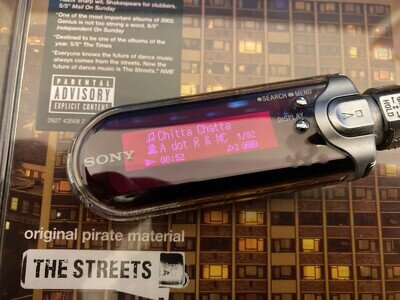 Sony Walkman NW-E407 (1GB) Digital Media Player (Ruby Colour)