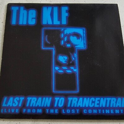 The KLF (e) - Last Train To Trancentral (Live From The Lost Continent) 1991 - 7"