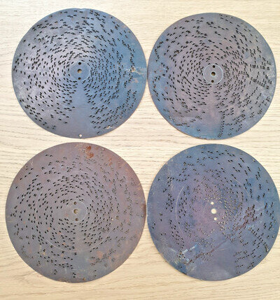 Four vintage Polyphon music box discs 9 1/2" diameter