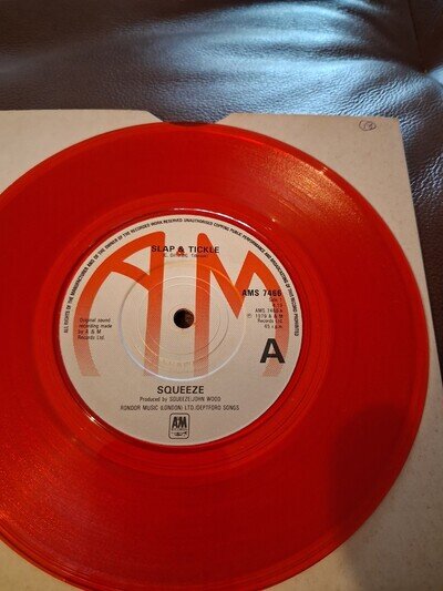 SQUEEZE, SLAP & TICKLE RED VINYL 7" SINGLE.