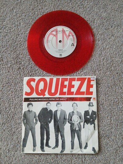 Squeeze - Pulling Mussels (From A Shell) 7" Red Vinyl Single Record