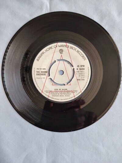 THE DOOBIE BROTHERS "EYES OF SILVER" 1974 7" PROMO SINGLE IN A PLAIN SLEEVE