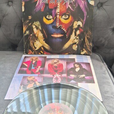 DAVID LEE ROTH - Eat 'Em and Smile Warner Bros. 1986 12" Black Vinyl LP 33RPM