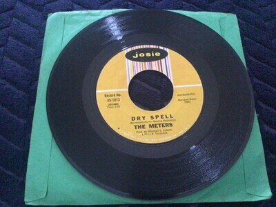 The Meters Dry Spell / Little old money maker 7" styrene single record.