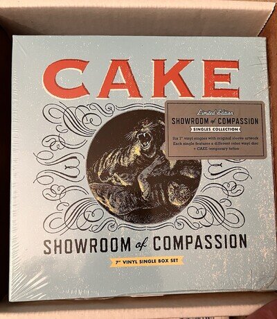 Cake - Showroom of Compassion - 7” Vinyl Single Box Set - Brand New