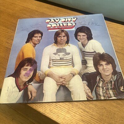 Bay City Rollers Vinyl Rollin with band signatures.