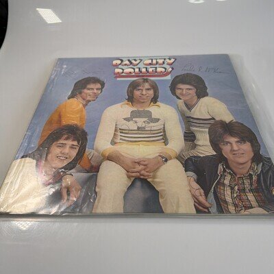 Bay City Rollers Vinyl Rollin with band signatures.