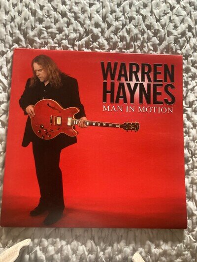 'Man In Motion' by Warren Haynes on PRD 734 from 2011. Vinyl NM, Sleeve VG+.