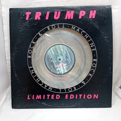 Triumph Rock & Roll Machine Limited Edition 12" Silver Vinyl LP. LATX 1036