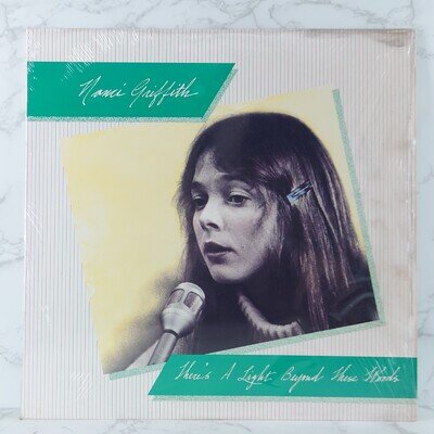 Nanci Griffith – There's A Light Beyond These Woods 12" Vinyl Album LP EX 1986