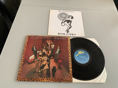 REO SPEEDWAGON...NINE LIVES...VERY FINE RARE UK FIRST ISSUE ALBUM + INSERT.