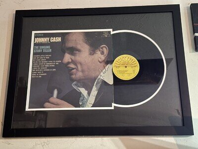 Autographed Johnny Cash record album The Singing Story Teller