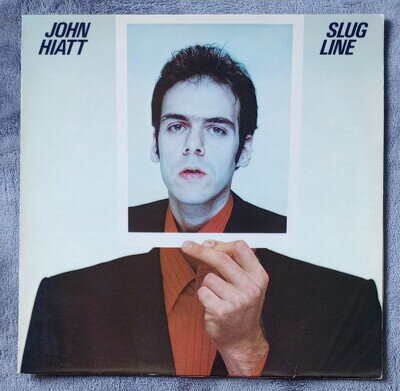 John Hiatt - "Slug Line" - 12" LP Vinyl - MCF3005 - MCA 1979 - Grade: VG/EX