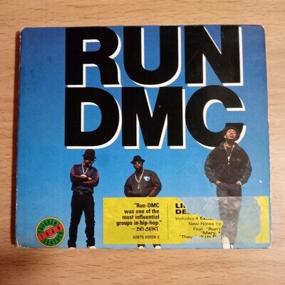 Run DMC Tougher Than Leather Rare Resuire Album With Four Bonus Tracks.