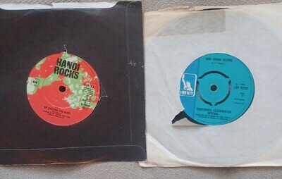 2 x 7". HANOI ROCKS UP AROUND THE BEND 7" VINYL UK CREEDENCE BAD MOON