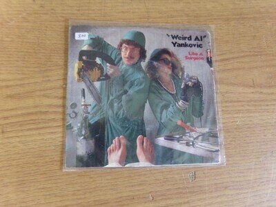 45 RPM RECORD WITH PICTURE SLEEVE WEIRD AL YANKOVIC LIKE A SURGEON