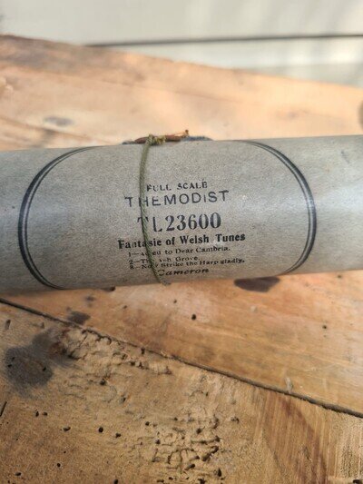 vintage full-scale Aeolian Pianola Themodist player piano roll